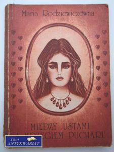 MIDZY USTAMI A BRZEGIEM PUCHARU - 2822546687